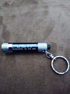 SAMMLER SCHLÜSSELANHÄNGER MIT TASCHENLAMPE AUS KANADA... - Bild 1 von 2