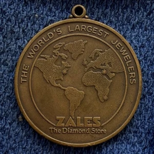 Ficha de latón vintage Zales Diamond Store Jewelers joyeros judíos más grandes del mundo - Imagen 1 de 2