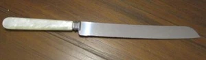 Cuchillo para pan vintage Sheffield England color crema con mango perlado - Imagen 1 de 4