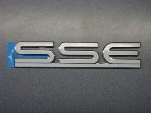 NOS OEM Pontiac Bonneville SSE Trunk Nameplate Emblem 1996 - 99 WHITE
