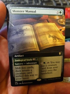 Monster Manual - Extended Art -MTG CLB Battle For Baldur's Gate 591 Rare Regular - Picture 1 of 2