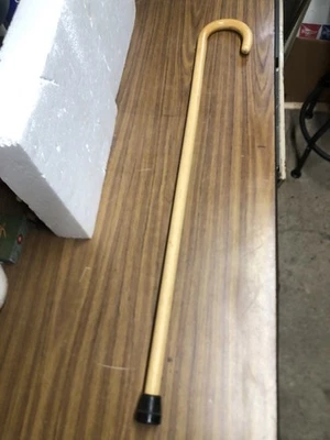 Bastón de madera bonito acabado madera con fondo de goma usado Foto 1 de 4