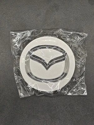 Tapacubos centrales de rueda plateados MAZDA 56 mm - Mazda 3/5/6, Miata, RX7, RX8, CX-3/5/7/9   Foto 1 de 3