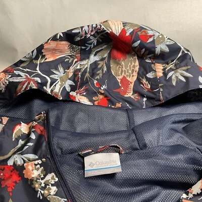 Columbia Sportswear Company Chaqueta de Lluvia Azul Marino con Floral/Pájaros Talla L Damas Foto 1 de 4