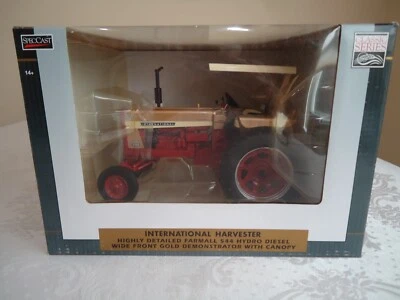 SpecCast 1/16 IH Farmall 544 Hydro Diesel Wide Front Gold Demonstrator  w/Canopy - Image 1 of 4