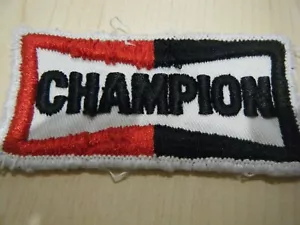 CHAMPION SPARK PLUGS PERIOD FABRIC SEW ON BADGE RARE NIGEL MANSELL SENNA PROST - Picture 1 of 2