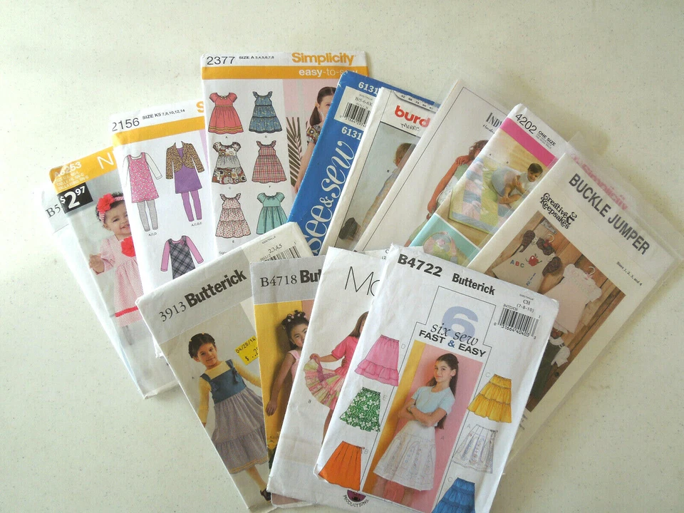 Toddler & Girls Sewing Patterns - Dresses, Skirts, Tops, Overalls, etc. - Uncut - Image 1 of 1