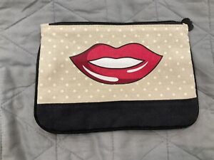 Ipsy lip glam bag Tan, Black And White With Red Smooch Lips On Front Bag Only.