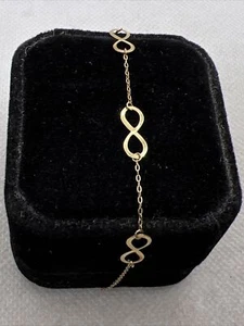 18K (750) Yellow Gold INFINITY Chain Ladies Bracelet (6.75”Min - 7.5”Max) 0.6gr. - Picture 1 of 12