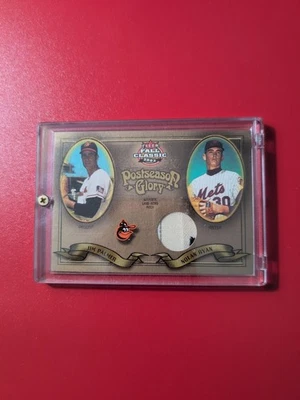 2003 FLEER FALL CLASSIC NOLAN RYAN JIM PALMER 19/75 GAME USED WORN JERSEY PATCH - Image 1 of 3