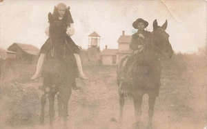 RPPC CHILDREN BOY AND GIRL RIDE HORSES ON FARM c1910 REAL PHOTO POSTCARD 110525 - Picture 1 of 4