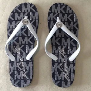 Neu ohne Etikett Michael Kors Flip-Flops schwarz/weiß; 11, Logo mit silbernen Akzenten; Strand - Bild 1 von 5