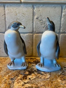 Coppia gruppo statuine pinguini porcellana Lladro Pinguini #5249 & #5247 - Foto 1 di 10