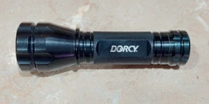 Dorcy LED Aluminum Black Flashlight 5" W/ Panasonic AAA Rechargeable Batteries - Picture 1 of 4