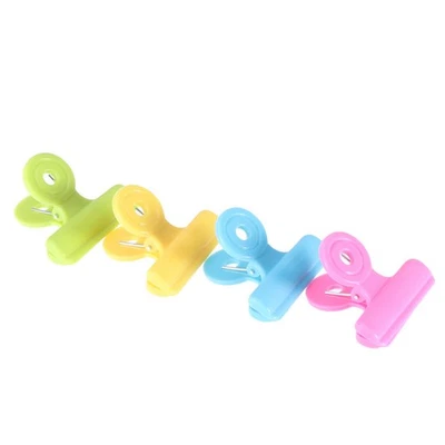  16 piezas sujetadores de papel plástico clips de sellado de alimentos abrazaderas para encuadernación de oficina Foto 1 de 4