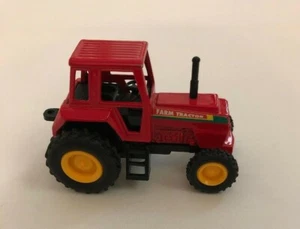 Tractor TOYSMITH JUMBO TREADIN' ROJO - Tire hacia atrás y déjelo ir 4" fundido a presión - Imagen 1 de 5