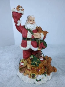 Internationale Weihnachtsmann-Sammlung: Weihnachtsmann mit Welpen am Weihnachtstag 12 Zoll... - Bild 1 von 5
