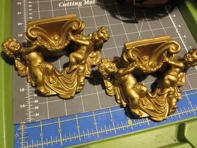 Pair of 2 Vintage Heavy Gold Tone Double Cherub Wall Shelfs Ceramic 6" Across - Image 1 of 3