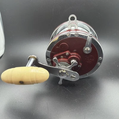 Vintage Penn Master Mariner Silver & Maroon Fishing Reel 349 - Image 1 of 4