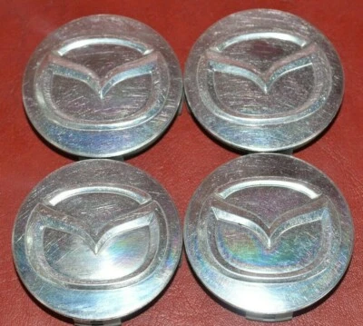 Tapacubos centrales de rueda protectora Mazda 626 Millenia 2114 1997-2002 OEM Foto 1 de 4