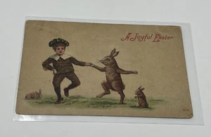 c.1910 A Joyful Easter Postcard Boy Dancing With Bunny Rabbit - Picture 1 of 2