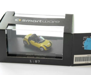 MMC Smart Roadster in giallo amarillo giallo, Smartware Busch 0014183 1:87 H0 confezione originale - Foto 1 di 1