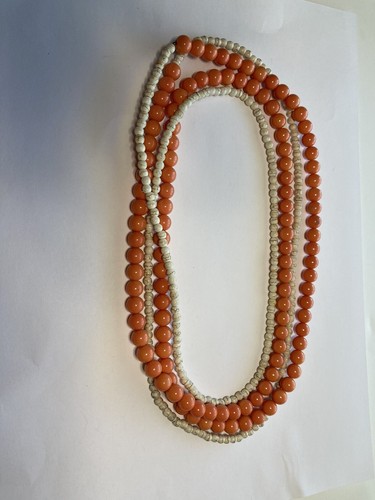 OFF WHITE 68” strand of peach and off white bead necklace