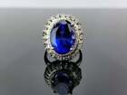 Beautiful Oval 12.CT Tanzanite Without Any Inclusions & White CZ Royal Look Ring