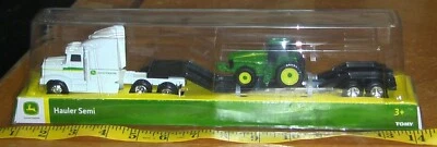 Semirremolque Tomy John Deere 2021 nuevo en paquete con tractor 1:64 Foto 1 de 4