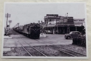 Vintage Black & White Photo Of A Train Passing Through A Town - Picture 1 of 3