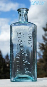 CHOICE antique OPTICIAN - EYE REMEDY hand blown EMBOSSED medicine bottle - Picture 1 of 4