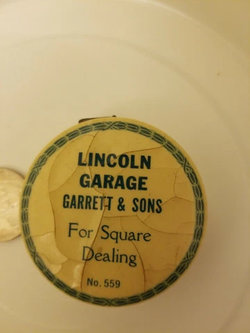Vintage Lincoln Garage Garrett & Sons tape measure -some cracking Cover