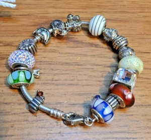 Pandora Sterling Silver Bracelet with 17 Charms and Dust Bag in Ex Condition - Picture 1 of 5