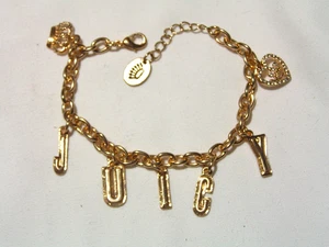 ...JUICY COUTURE...Gold Tone, Crystals Charm Bracelet... - Picture 1 of 6