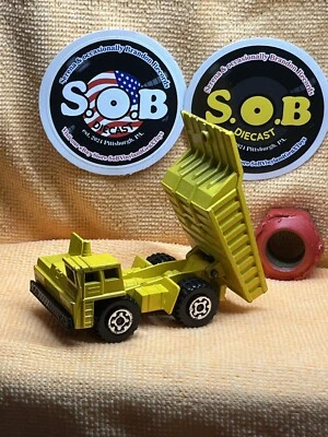 Camión de volteo Lesney Matchbox 1976 Faun n.º 56 amarillo fundido a presión casi nuevo Foto 1 de 4