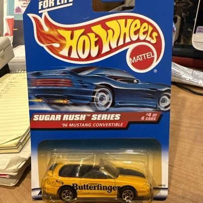 Mustang convertible amarillo Nestlé Butterfinger #744 Hot Wheels '96 Foto 1 de 4