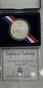1991 USO 50th Anniversary Commemorative Coin UNC Silver Dollar - Picture 1 of 2