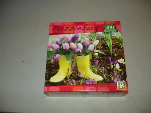 Puzzlebug 500 Piece Puzzle - Yellow Boots in the Garden - Brand New, Sealed - Picture 1 of 4