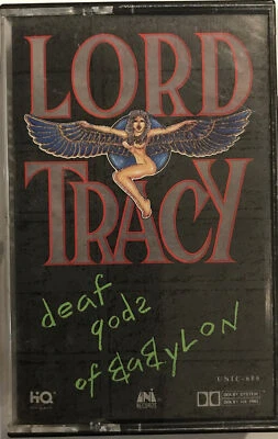 Lord Tracy – Deaf Gods Of Babylon Cassette 1989 UNI Records – UNIC-606 [PROMO] - Image 1 of 2