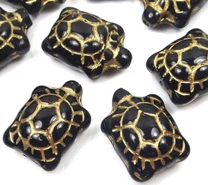 4 cuentas de tortugas de vidrio checas 19x14 mm - negras - incrustaciones doradas - Imagen 1 de 3