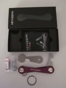 Keykeepa V2 Schlüsselanhänger Schlüssel Organizer + Einkaufswagenlöser Lila Neu - Bild 1 von 4