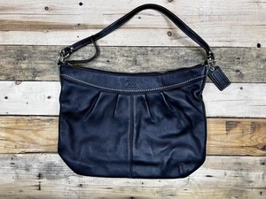 Bolso de hombro y bolso antipolvo Coach plisado de cuero negro para mujer - Imagen 1 de 10