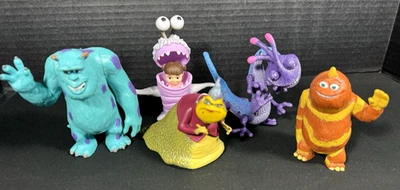 Lote de 5 bonecos Monsters Inc Disney Pixar Sulley Roz Boo George Randall Boggs - Imagem 1 de 4