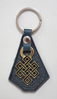 Mongolian handmade brass keychain "Ulzii khee" Ulzii pattern
