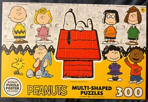Peanuts 9 mehrfarbige Puzzles 300 Stück insgesamt Charakterpuzzle. - Bild 1 von 2
