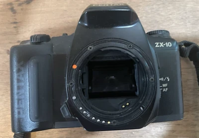 Cámara fotográfica Pentax ZX-10 35 mm SLR cámara de apuntar y disparar SIN PROBAR Foto 1 de 4