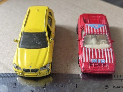 Juego 2 Coches Siku BMW X5 4.81, Maisto Nissan Mid 4 Coche Retro Vintage Foto 1 de 4