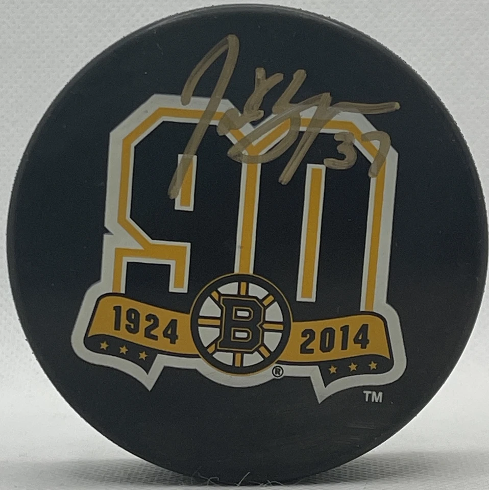 Disco de hockey firmado por Patrice Bergeron Boston Bruins 90 aniversario certificado de autenticidad Foto 1 de 1