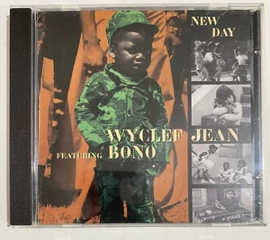 WYCLEF JEAN FEAT. BONO - NEW DAY - 1999 MEXICAN CD SINGLE, REGGAE - Picture 1 of 3