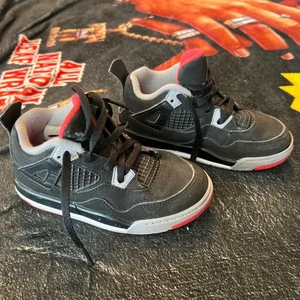 Jordan 4s niños talla 10c negro/rojo - Imagen 1 de 7